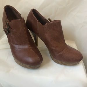 Tan and brown buckled platforms ankle booties